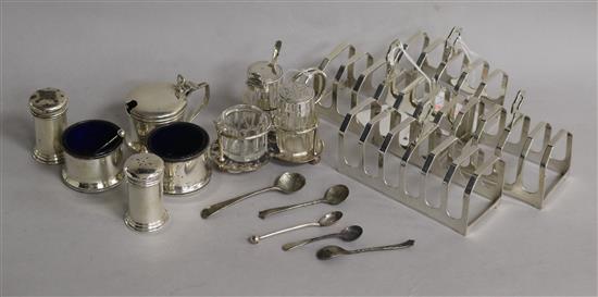 Two pairs of silver toast racks and sundry condiments,